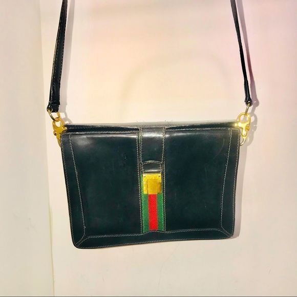 Gucci Handbags - Gucci black web leather purse with strap